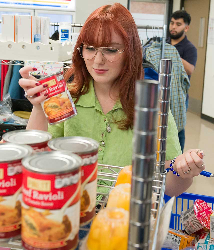 Student receiving food and clothing assistance