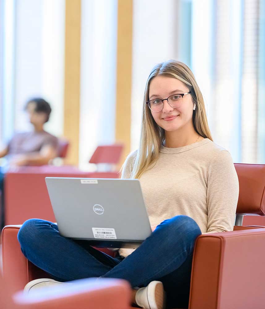 Student studying at library