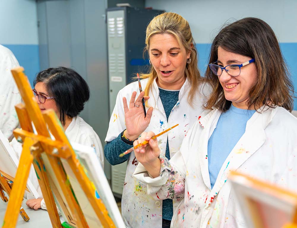 Neurodiversity presented while painting in class with their peers