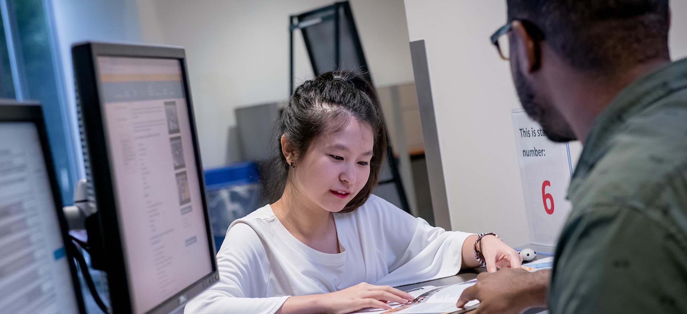 San Jacinto College Student Worker Helping Student